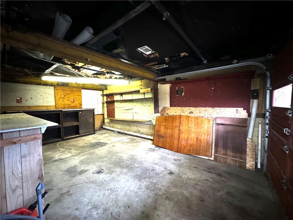 214 Coldren Road Perryopolis, PA 15473 - Photo 45 of 49 a view of a garage with refrigerator