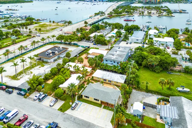 an aerial view of residential houses with outdoor space