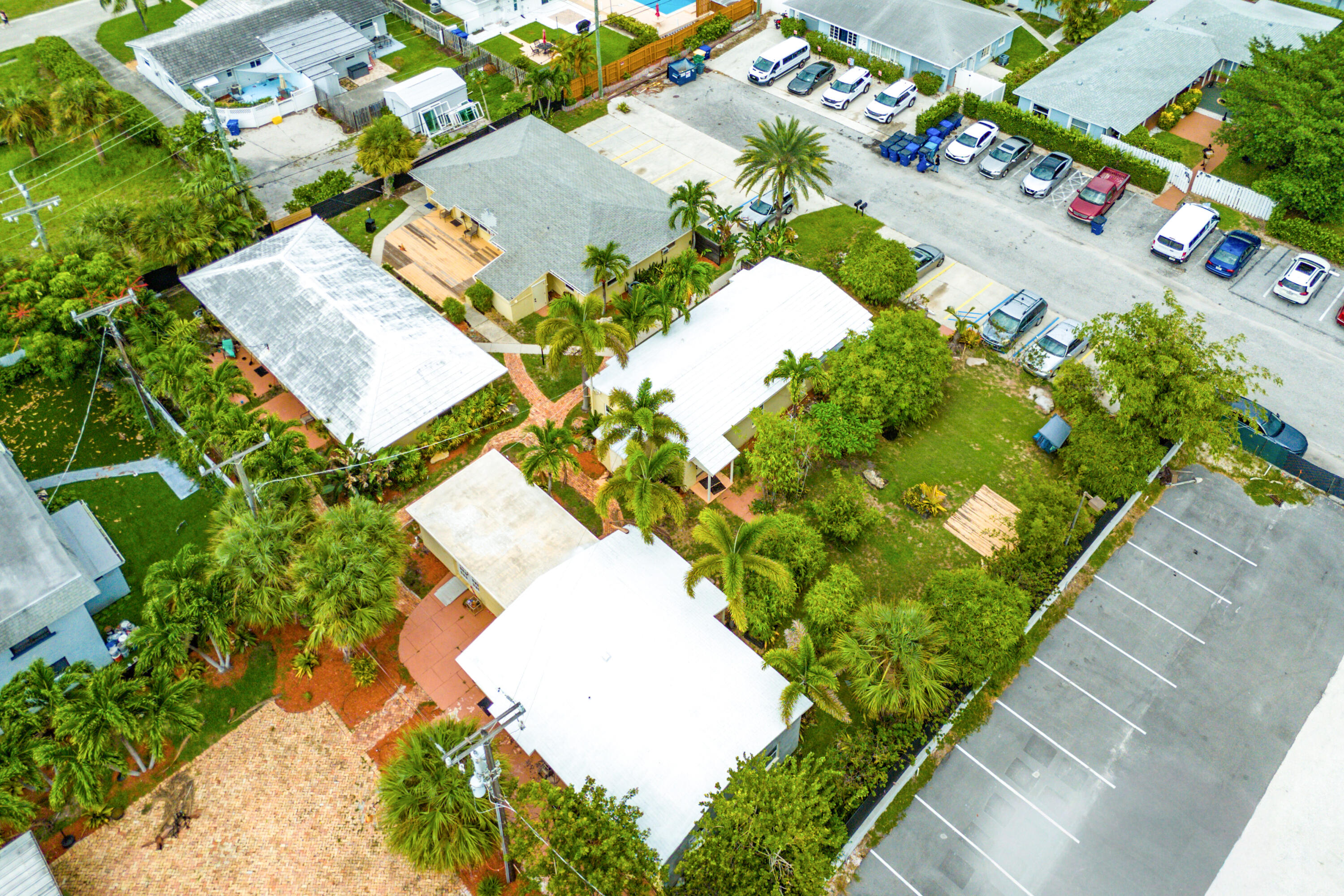 2637 West West Way, Unit A Riviera Beach, FL 33404 - Photo 19 of 42 an aerial view of a house with a yard and garden