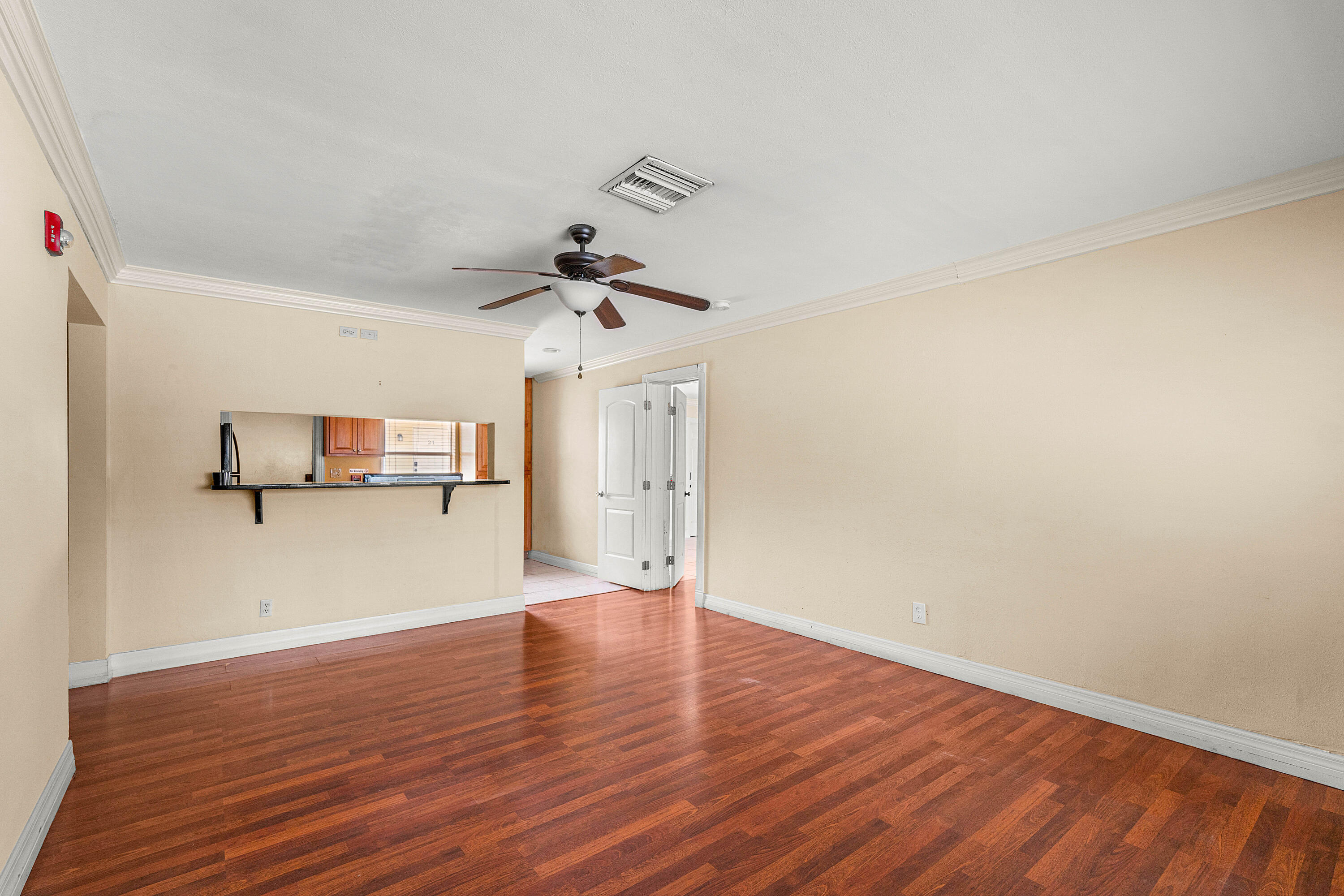 2637 West West Way, Unit A Riviera Beach, FL 33404 - Photo 31 of 42 a view of empty room with wooden floor