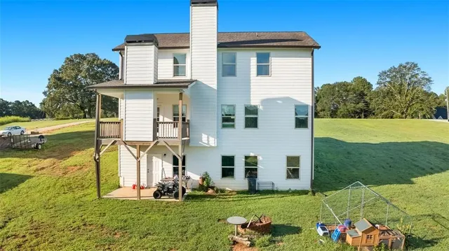 a view of a porch with a yard