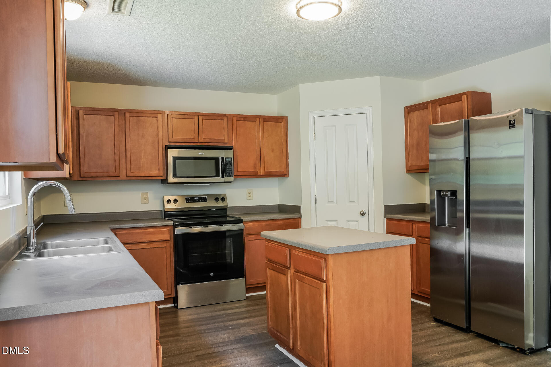 6817 Harter Court Raleigh, NC 27610 - Photo 6 of 24 007-photo-kitchen-15337308