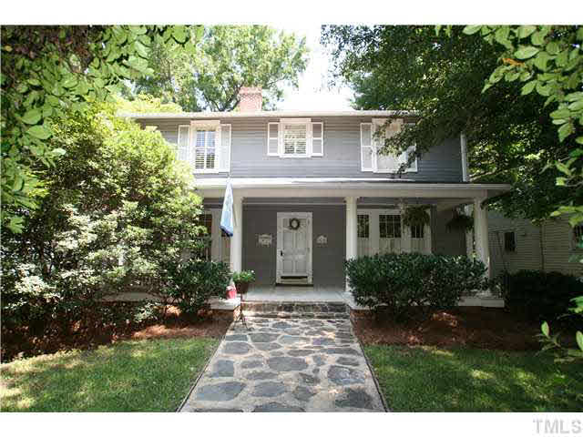 2112 Fairview Road Raleigh, NC 27608 - Photo 1 of 25 a front view of a house with garden