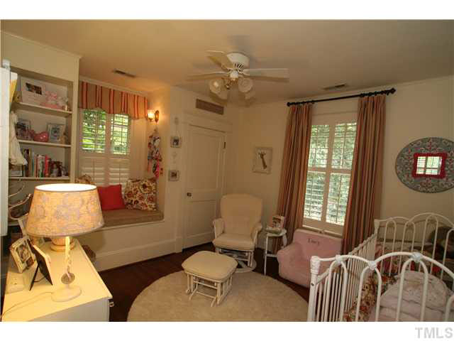 2112 Fairview Road Raleigh, NC 27608 - Photo 13 of 25 a living room with furniture and a window