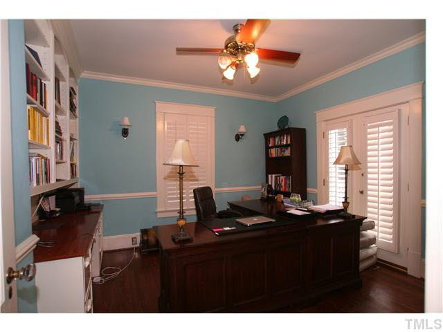 2112 Fairview Road Raleigh, NC 27608 - Photo 7 of 25 a living room with furniture and a flat screen tv
