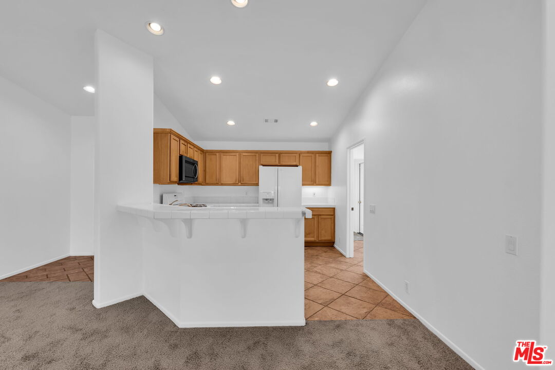 30940 Robert Road Thousand Palms, CA 92276 - Photo 17 of 48 a view of a kitchen with a sink