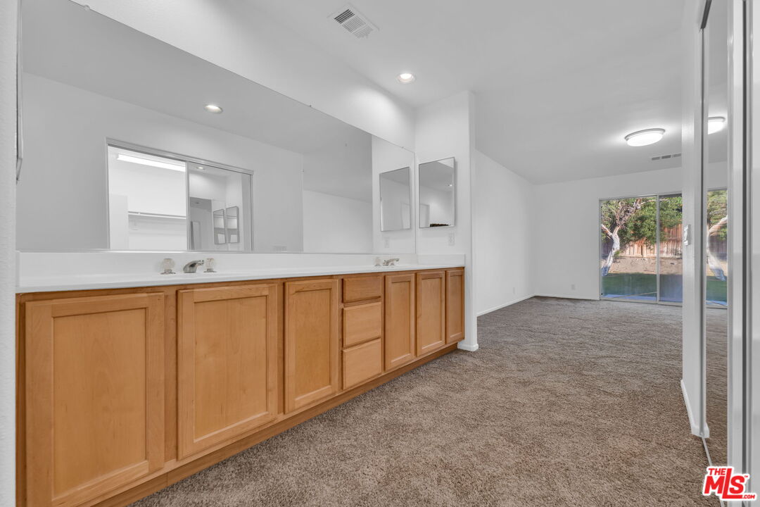 30940 Robert Road Thousand Palms, CA 92276 - Photo 38 of 48 a view of a kitchen with a sink