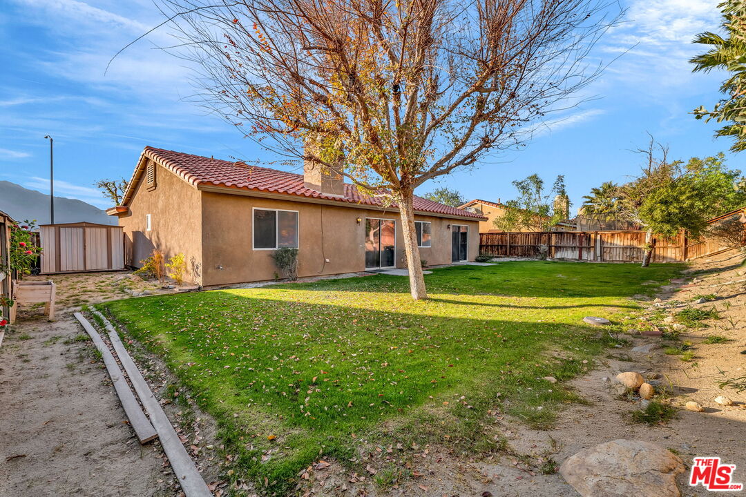 30940 Robert Road Thousand Palms, CA 92276 - Photo 45 of 48 a view of a house with a yard