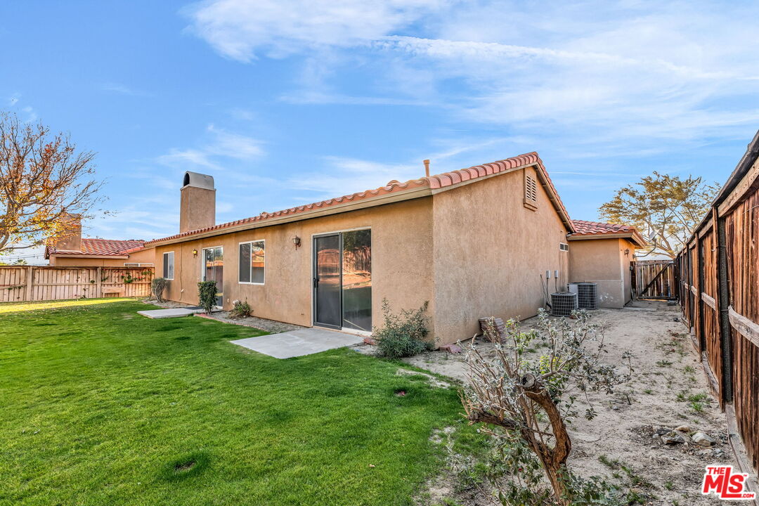 30940 Robert Road Thousand Palms, CA 92276 - Photo 48 of 48 a house view with a backyard space