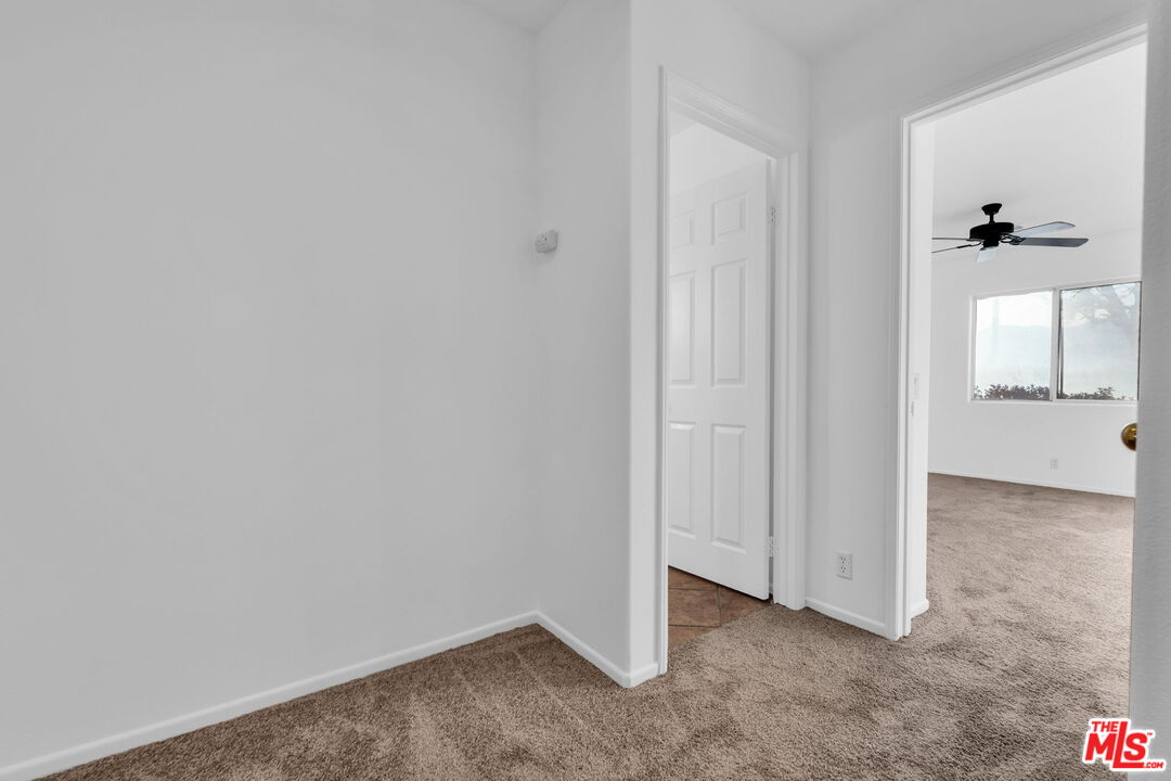 30940 Robert Road Thousand Palms, CA 92276 - Photo 9 of 48 a view of an empty room
