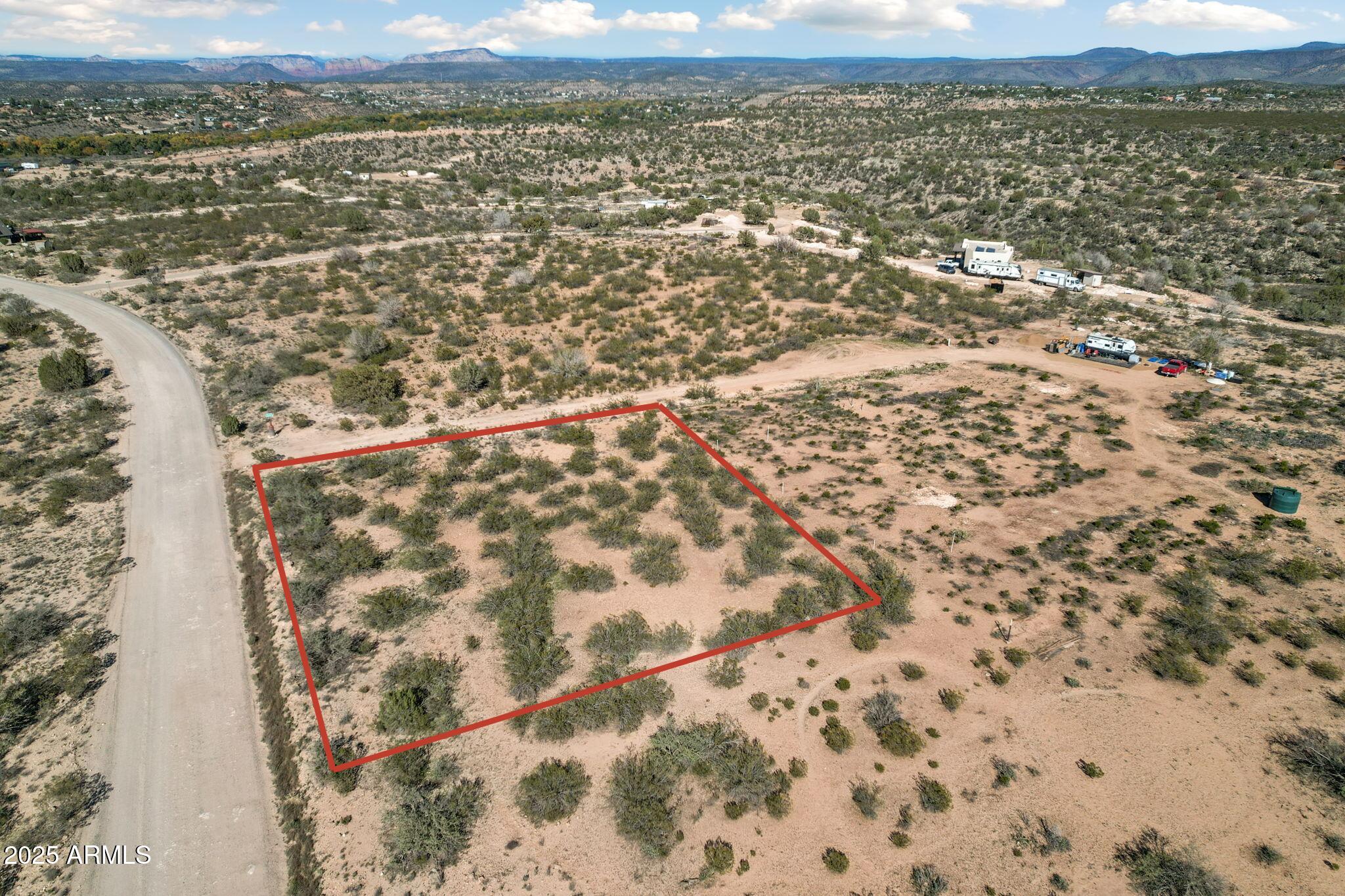 3325 Padre Kino Trail, Unit 170 Rimrock, AZ 86335 - Photo 3 of 9 an aerial view of residential houses with outdoor space