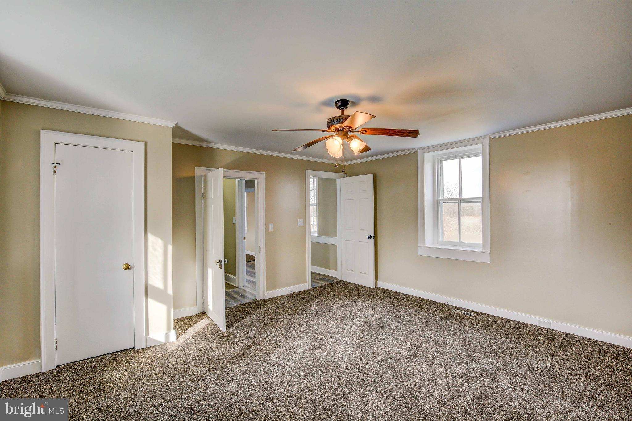 25208 Jerusalem Road Milford, VA 22514 - Photo 26 of 58 Master Bedroom with Ensuite Bathroom