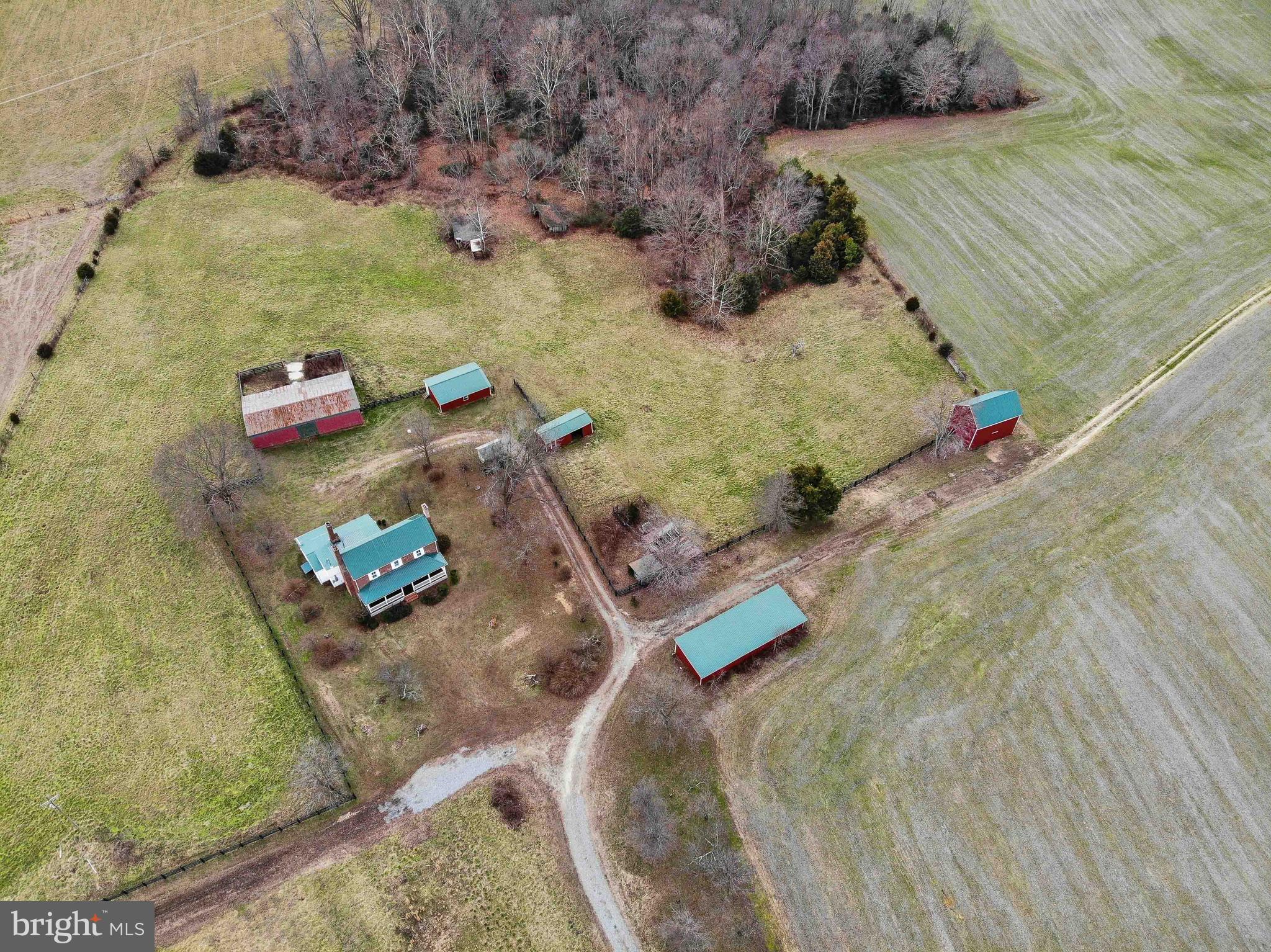 25208 Jerusalem Road Milford, VA 22514 - Photo 47 of 58 Aerial View of the House and 9 Outbuildings