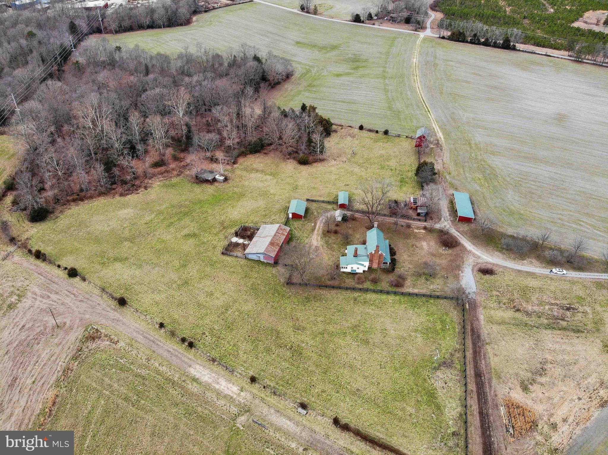 25208 Jerusalem Road Milford, VA 22514 - Photo 48 of 58 Aerial View of the House and 9 Outbuildings