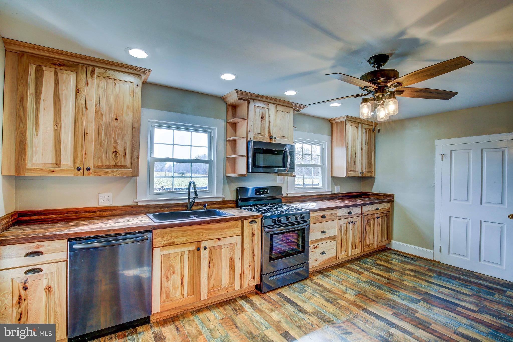 25208 Jerusalem Road Milford, VA 22514 - Photo 9 of 58 Kitchen with Black Stainless Steel Appliances