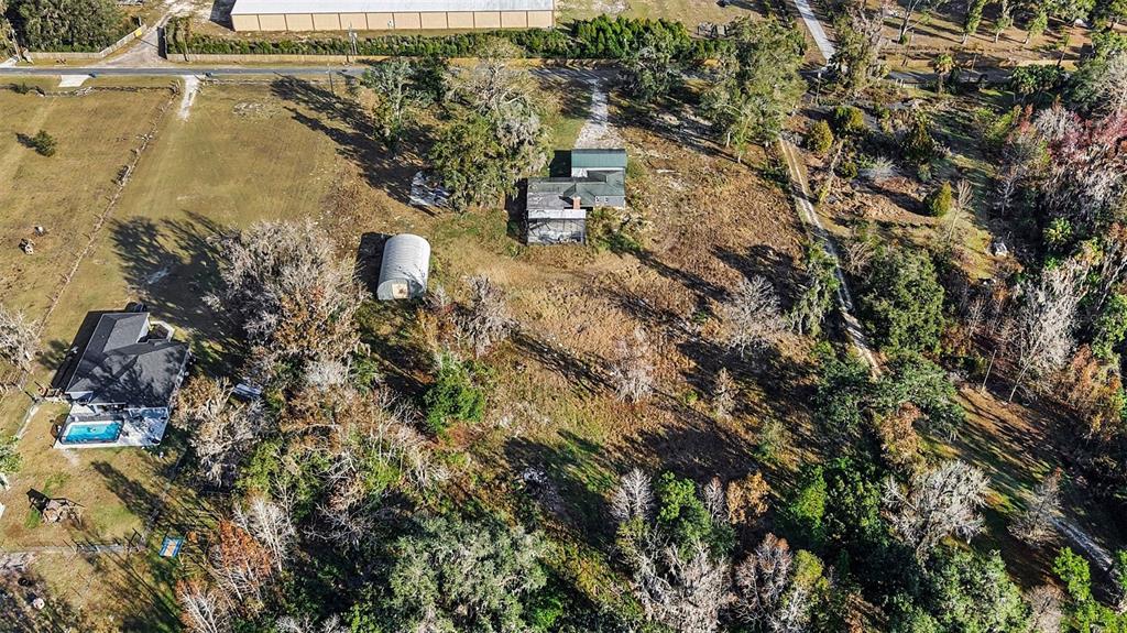 27178 Hickory Hill Road Brooksville, FL 34602 - Photo 17 of 18 a aerial view of a house with a yard