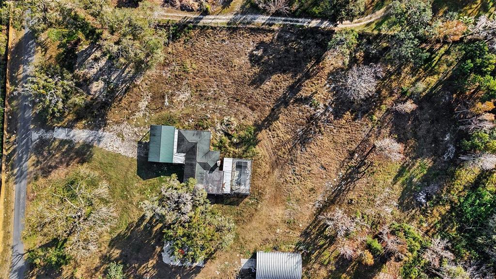 27178 Hickory Hill Road Brooksville, FL 34602 - Photo 18 of 18 a house view with a tree