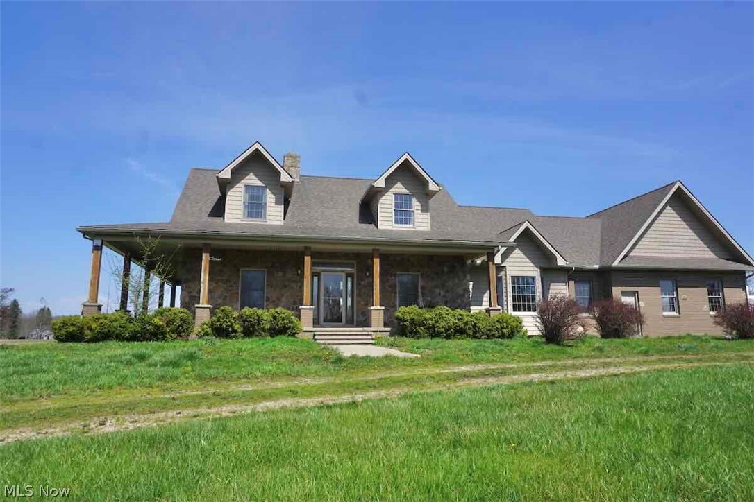 9835 Kile Road Chardon, OH 44024 - Photo 1 of 40 Beautiful cape cod home with wrap around front porch.