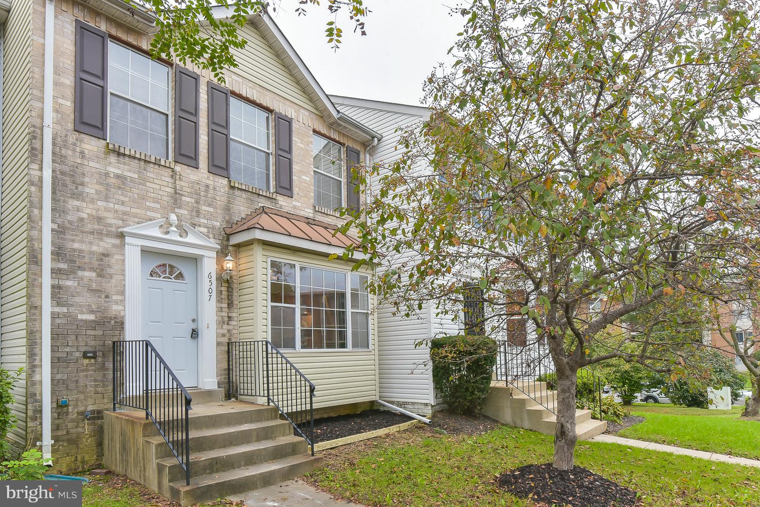 6507 Ronald Road Capitol Heights, MD 20743 - Photo 1 of 30 a front view of a house with a garden