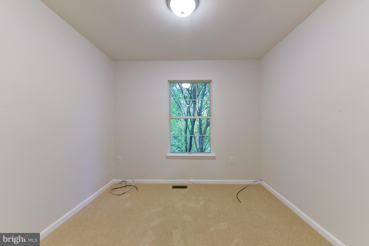 6507 Ronald Road Capitol Heights, MD 20743 - Photo 15 of 30 a view of an empty room with a window