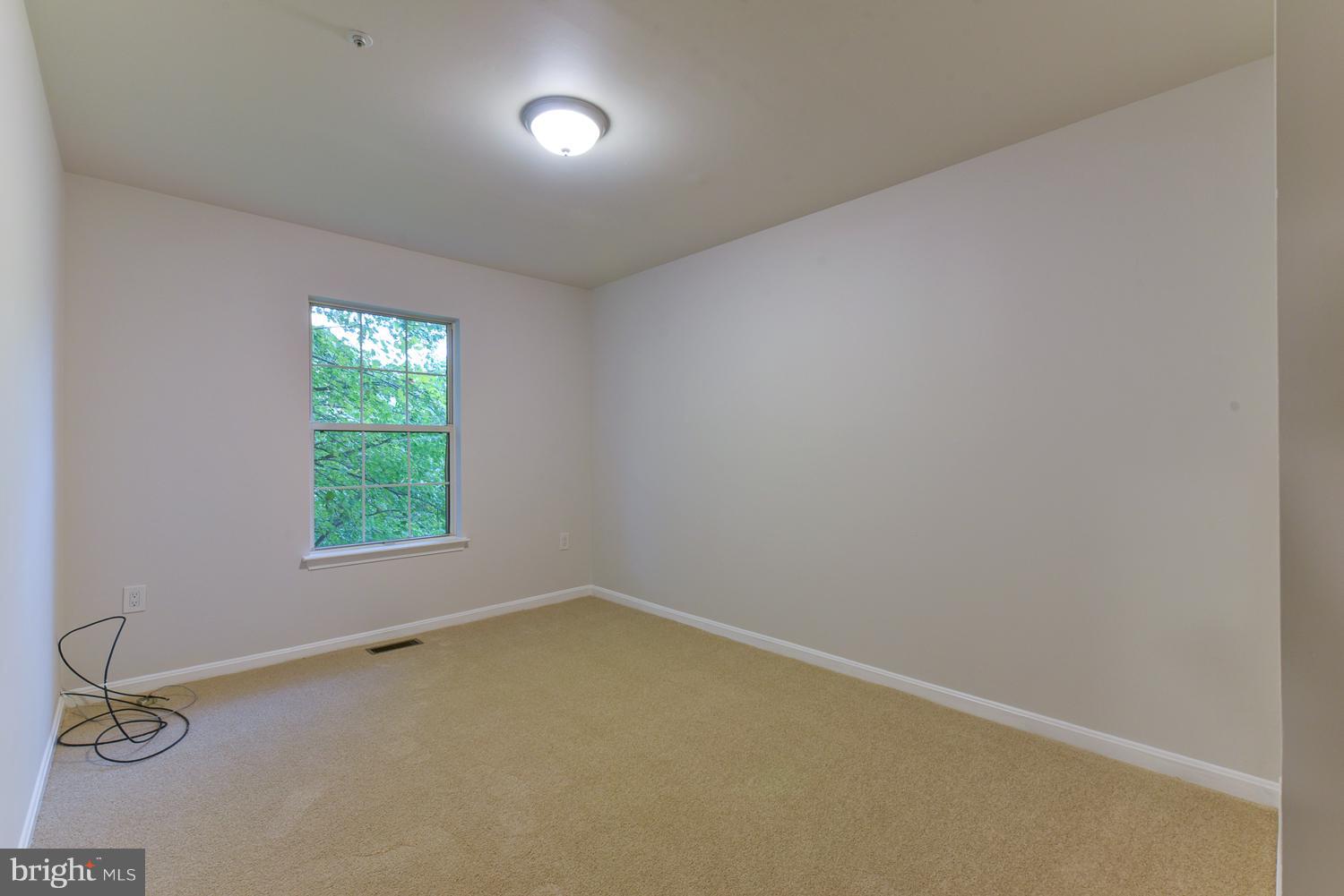 6507 Ronald Road Capitol Heights, MD 20743 - Photo 17 of 30 an empty room with a window