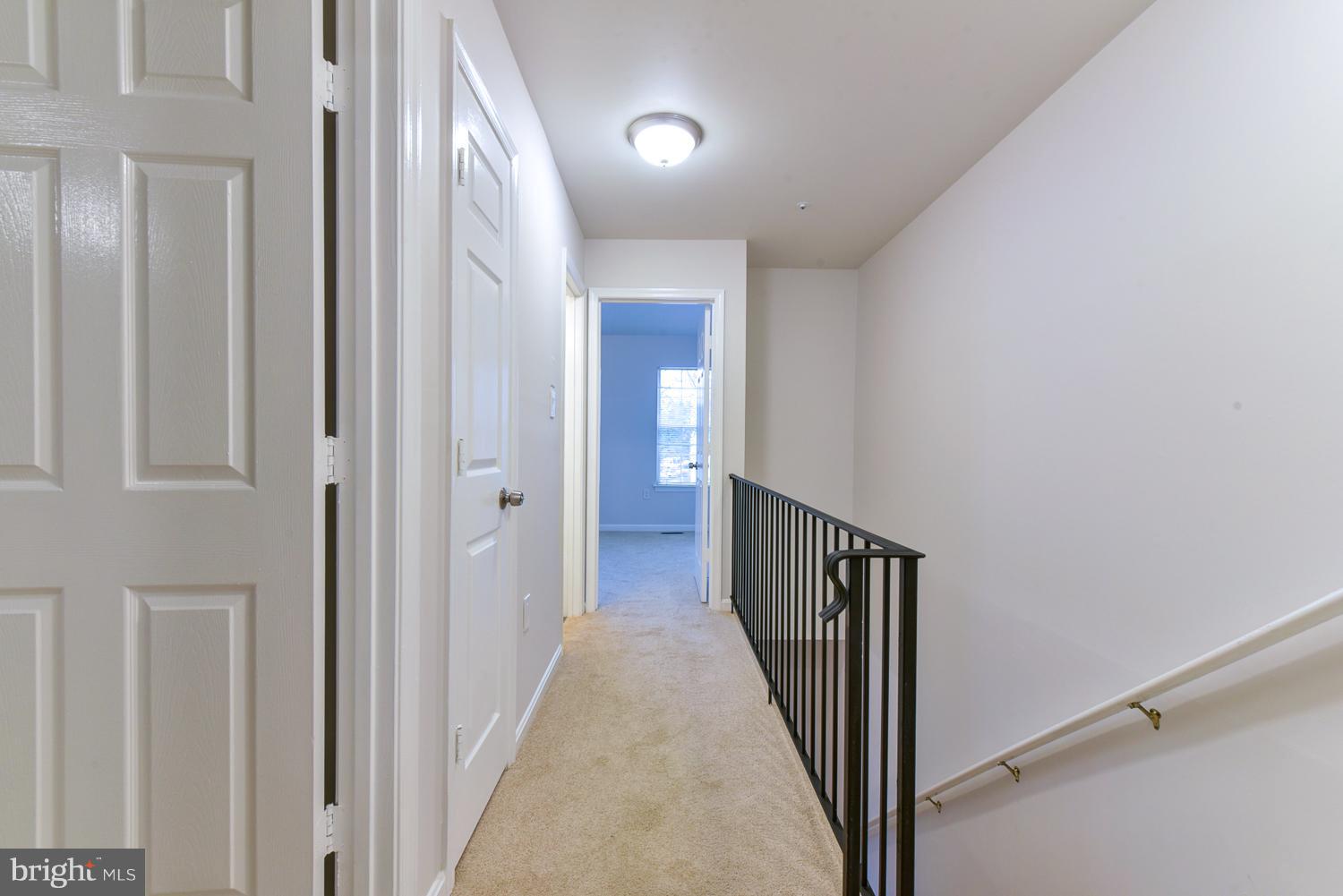 6507 Ronald Road Capitol Heights, MD 20743 - Photo 22 of 30 a view of hallway with stairs