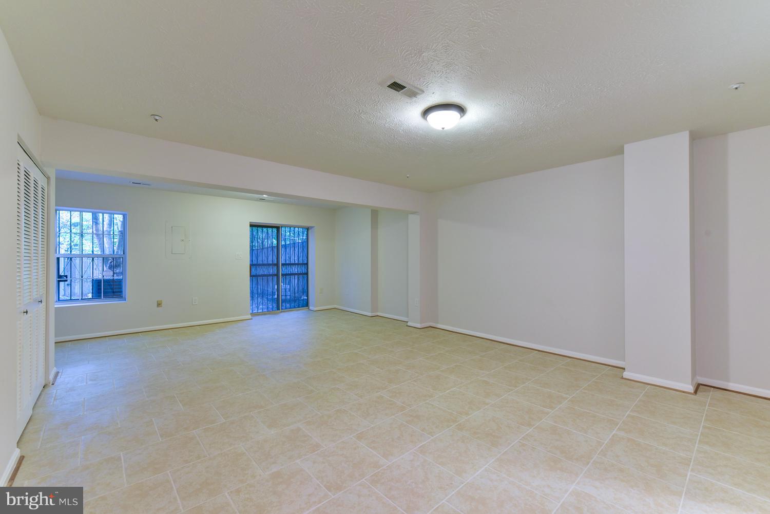 6507 Ronald Road Capitol Heights, MD 20743 - Photo 23 of 30 a view of an empty room with closet and window