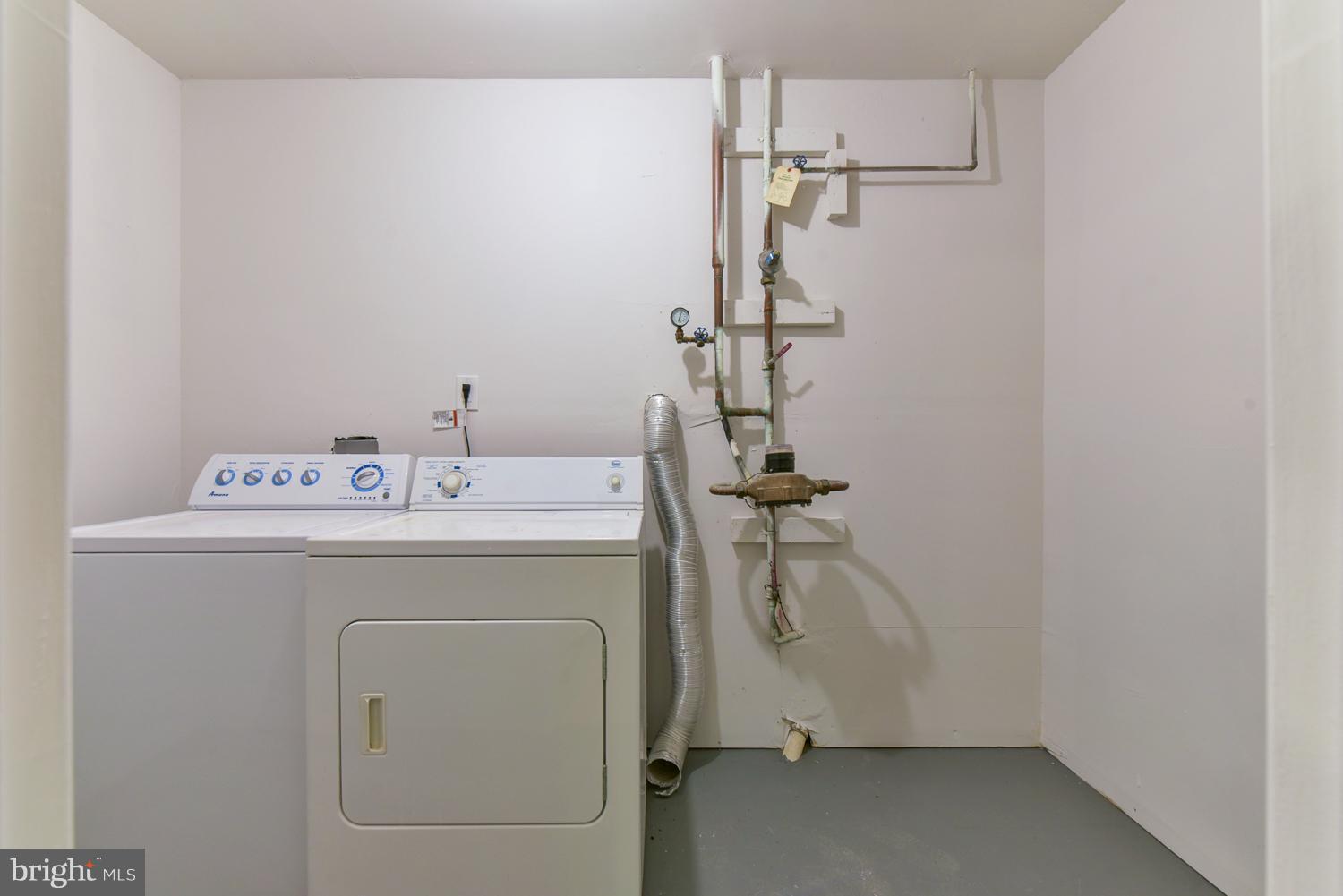 6507 Ronald Road Capitol Heights, MD 20743 - Photo 26 of 30 a utility room with dryer and washer