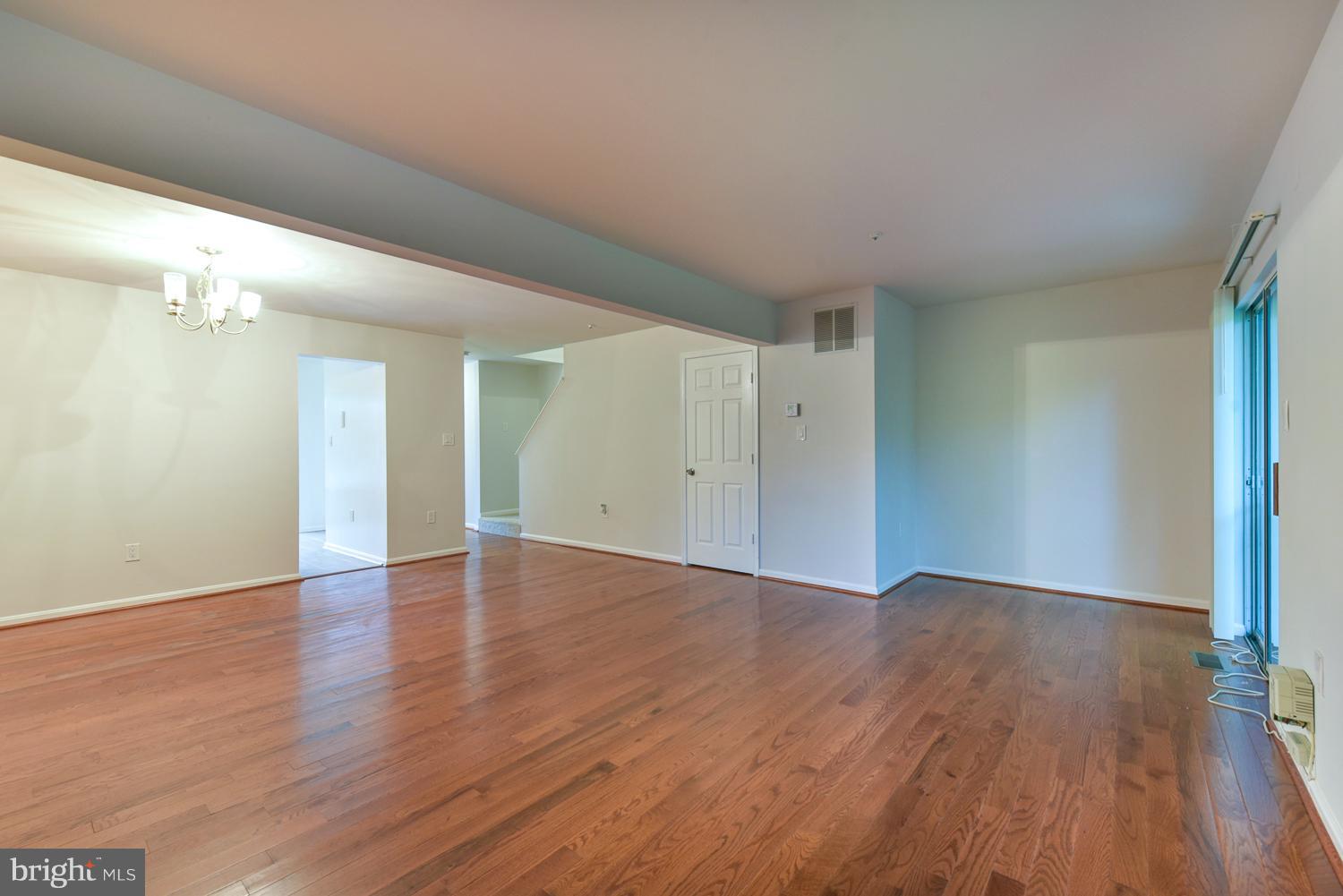 6507 Ronald Road Capitol Heights, MD 20743 - Photo 9 of 30 a view of an empty room with wooden floor