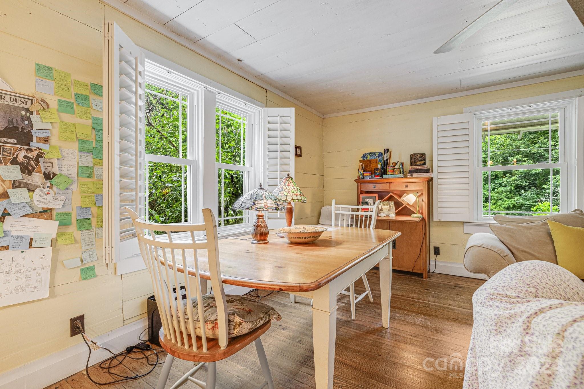 71 Persimmon Lane Canton, NC 28716 - Photo 13 of 41 a view of a dining room with furniture window and outside view