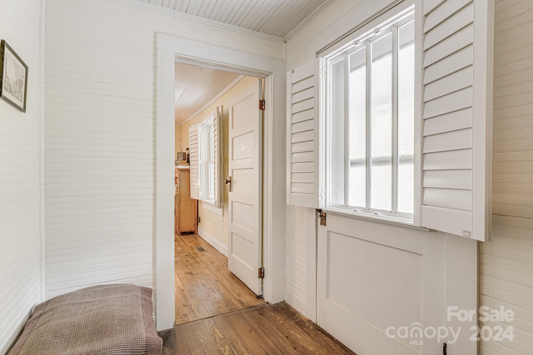 71 Persimmon Lane Canton, NC 28716 - Photo 15 of 41 a view of front door with wooden floor