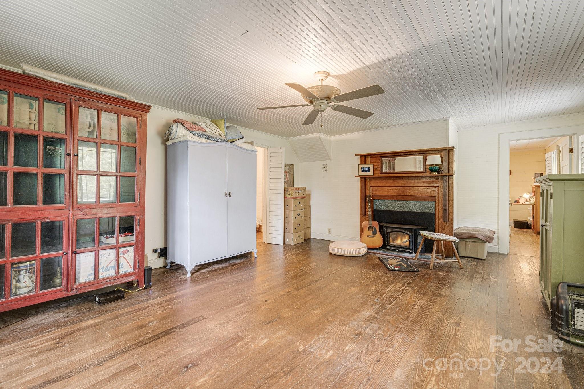 71 Persimmon Lane Canton, NC 28716 - Photo 18 of 41 a view of a livingroom with furniture and a flat screen tv