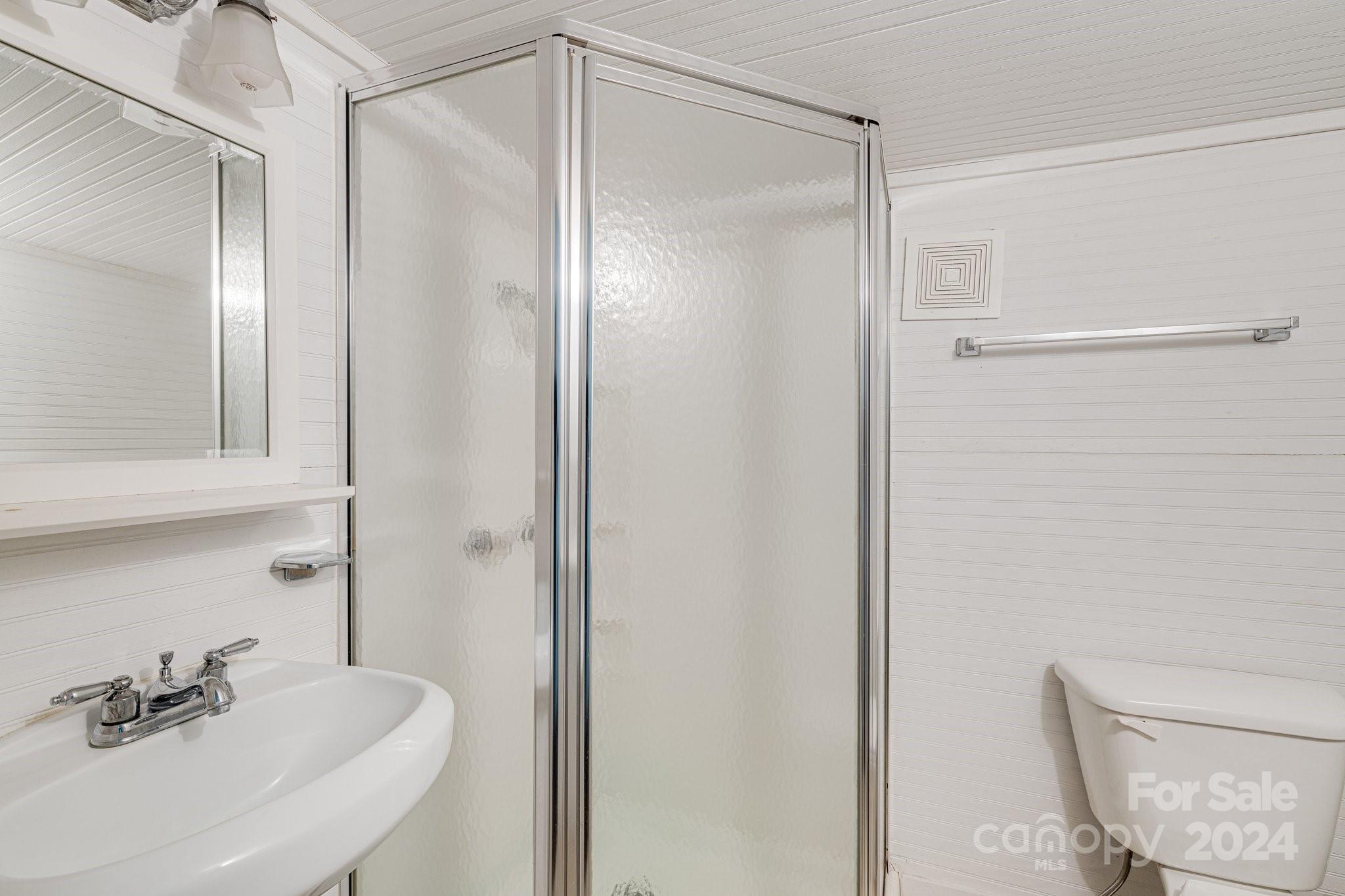71 Persimmon Lane Canton, NC 28716 - Photo 29 of 41 a bathroom with a shower and a sink