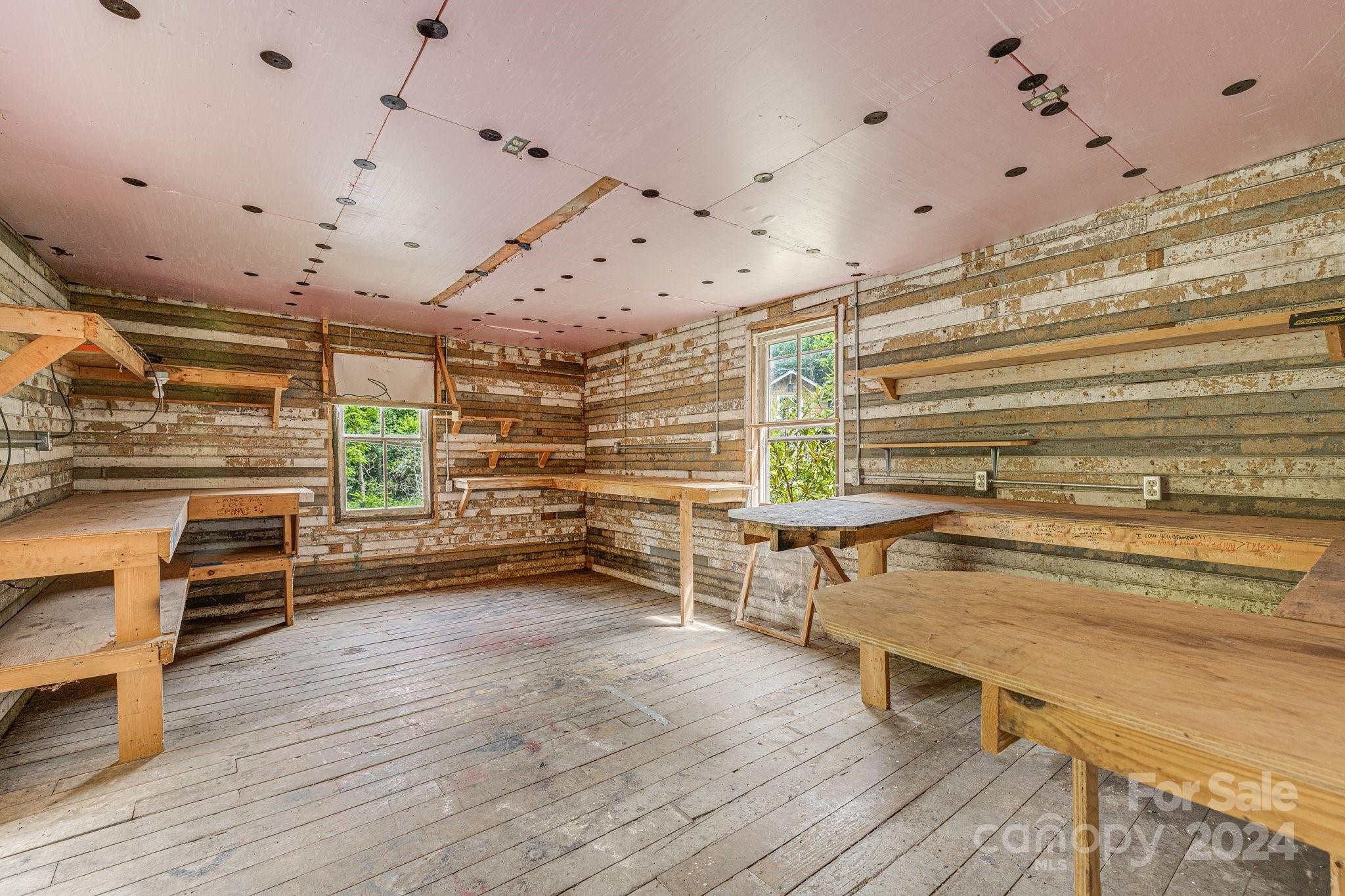 71 Persimmon Lane Canton, NC 28716 - Photo 37 of 41 a view of a room with wooden floor and furniture