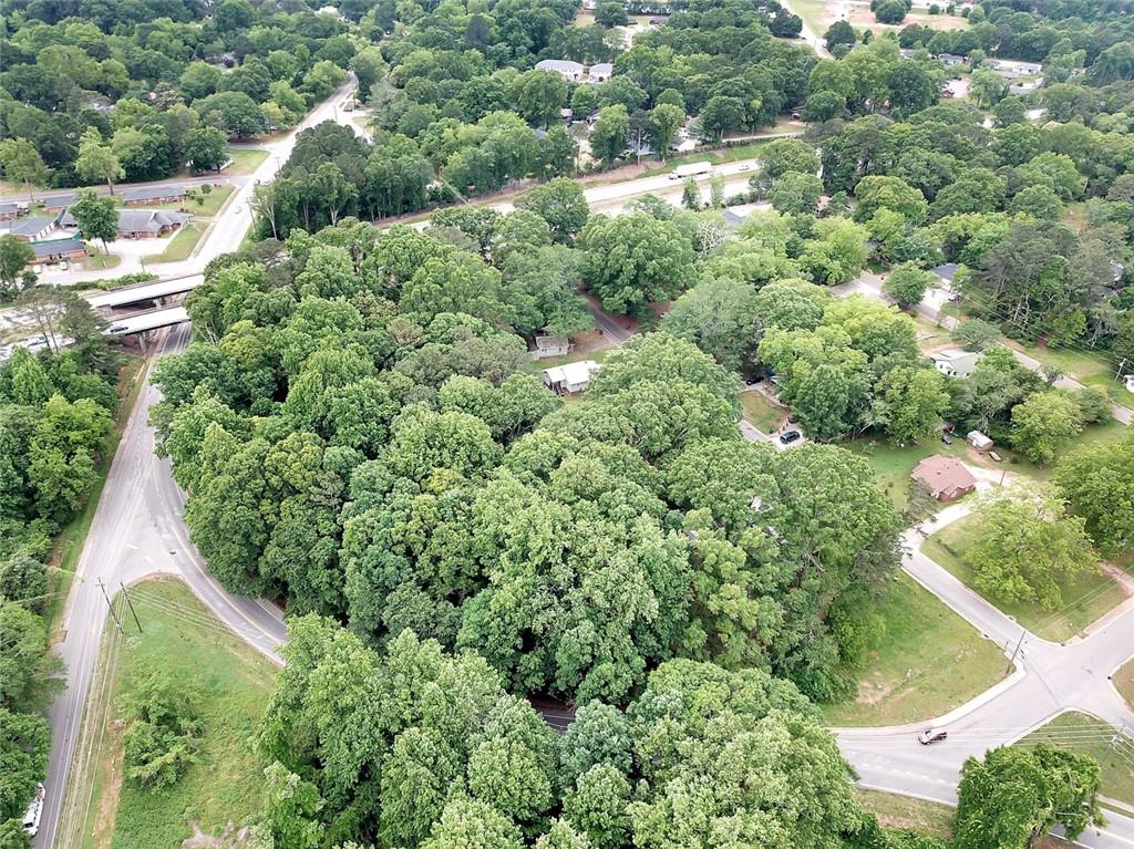 525 Birch Street Monroe, GA 30656 - Photo 4 of 6 an aerial view of residential house with outdoor space and trees all around