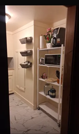 a view of storage and utility room