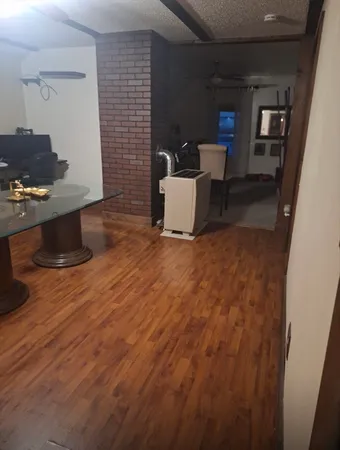 a view of a workspace with furniture