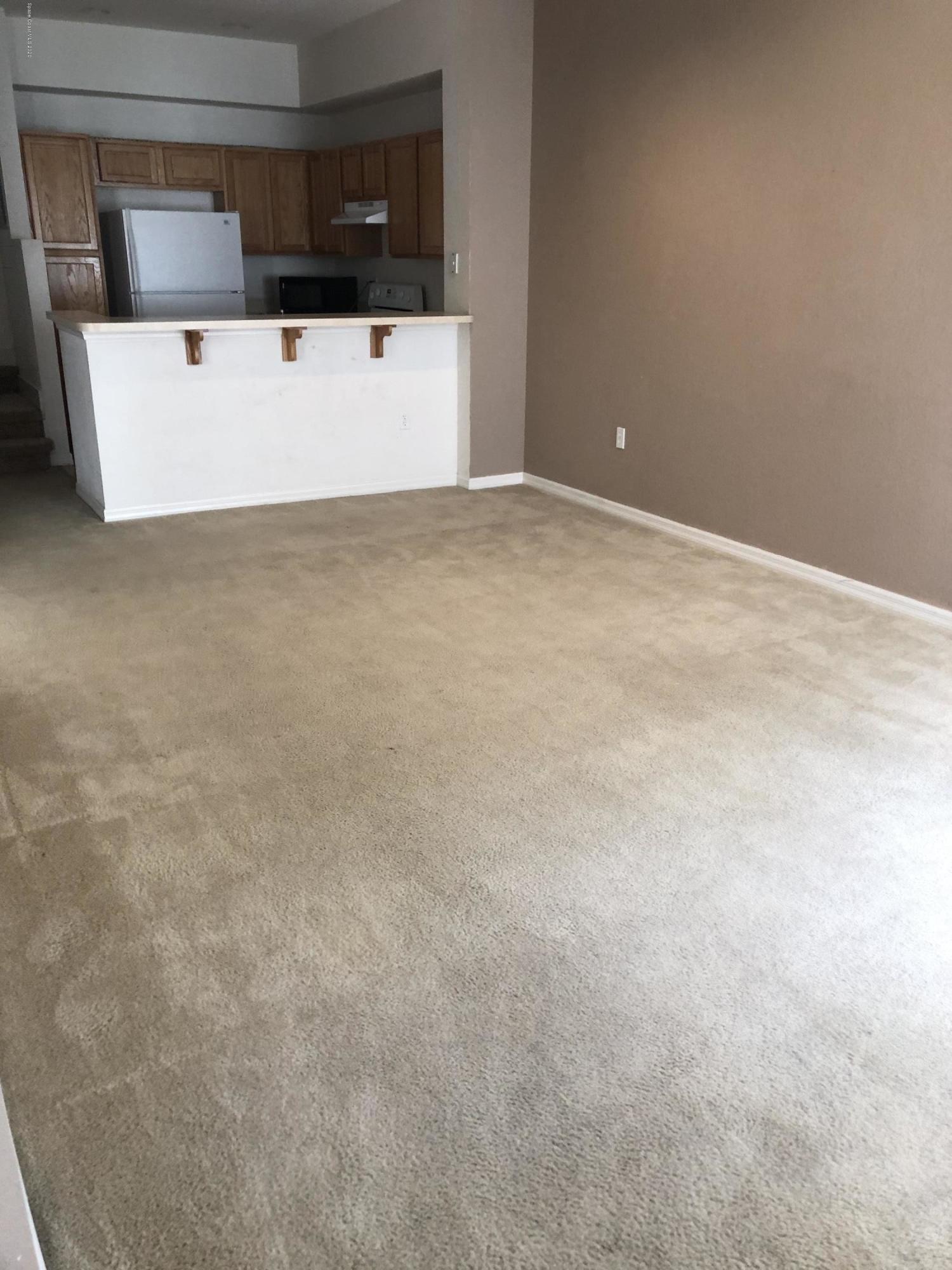 115 Turpial Way, Unit 106 Melbourne, FL 32901 - Photo 3 of 12 Living/Dining