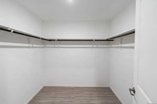 a view of a room with racks on the wall