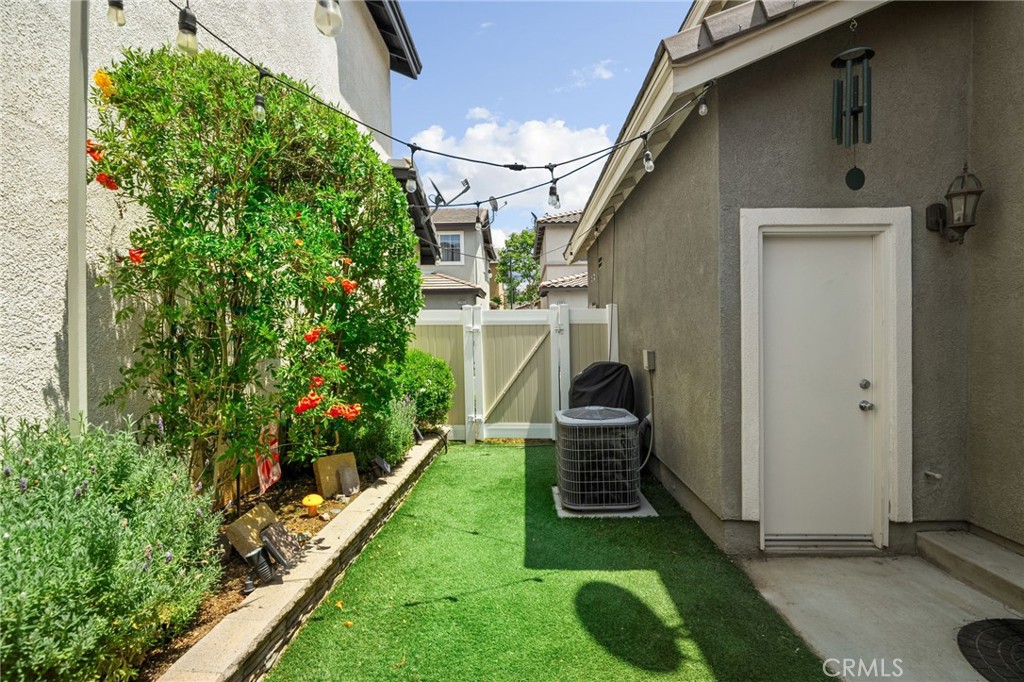 33942 Telstar Road Yucaipa, CA 92399 - Photo 31 of 40 a house view with a garden space