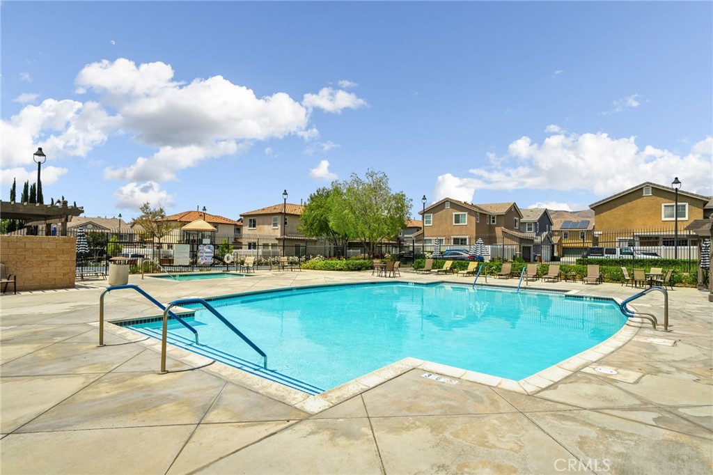 33942 Telstar Road Yucaipa, CA 92399 - Photo 33 of 40 a view of a swimming pool and a terrace