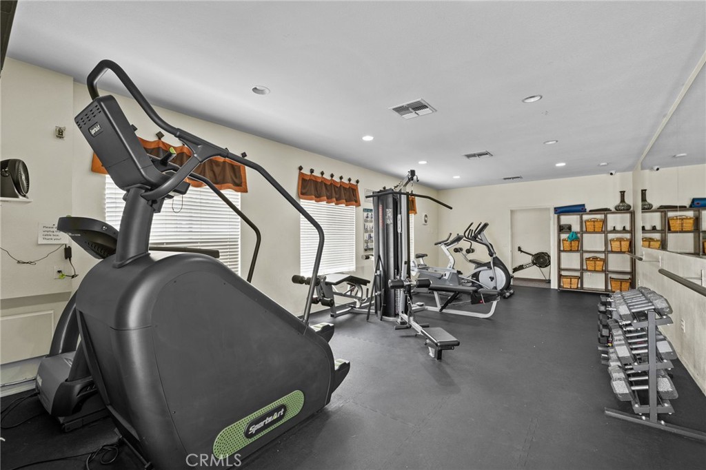 33942 Telstar Road Yucaipa, CA 92399 - Photo 39 of 40 a view of a room with gym equipment