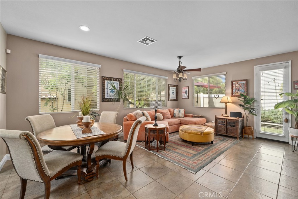 33942 Telstar Road Yucaipa, CA 92399 - Photo 10 of 40 a living room with furniture and a large window