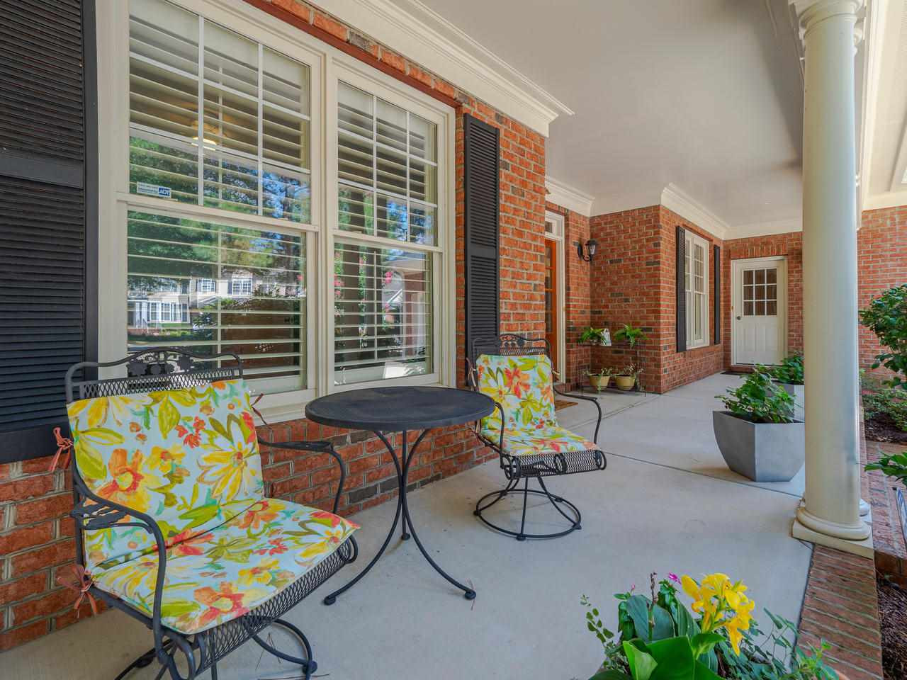 1217 Colonial Club Road Wake Forest, NC 27587 - Photo 4 of 30 A perfect porch to invite family and friends to socialize! Front Porch