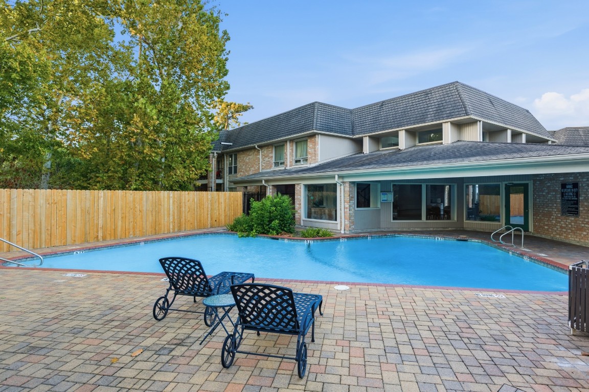 a view of house with outdoor seating space