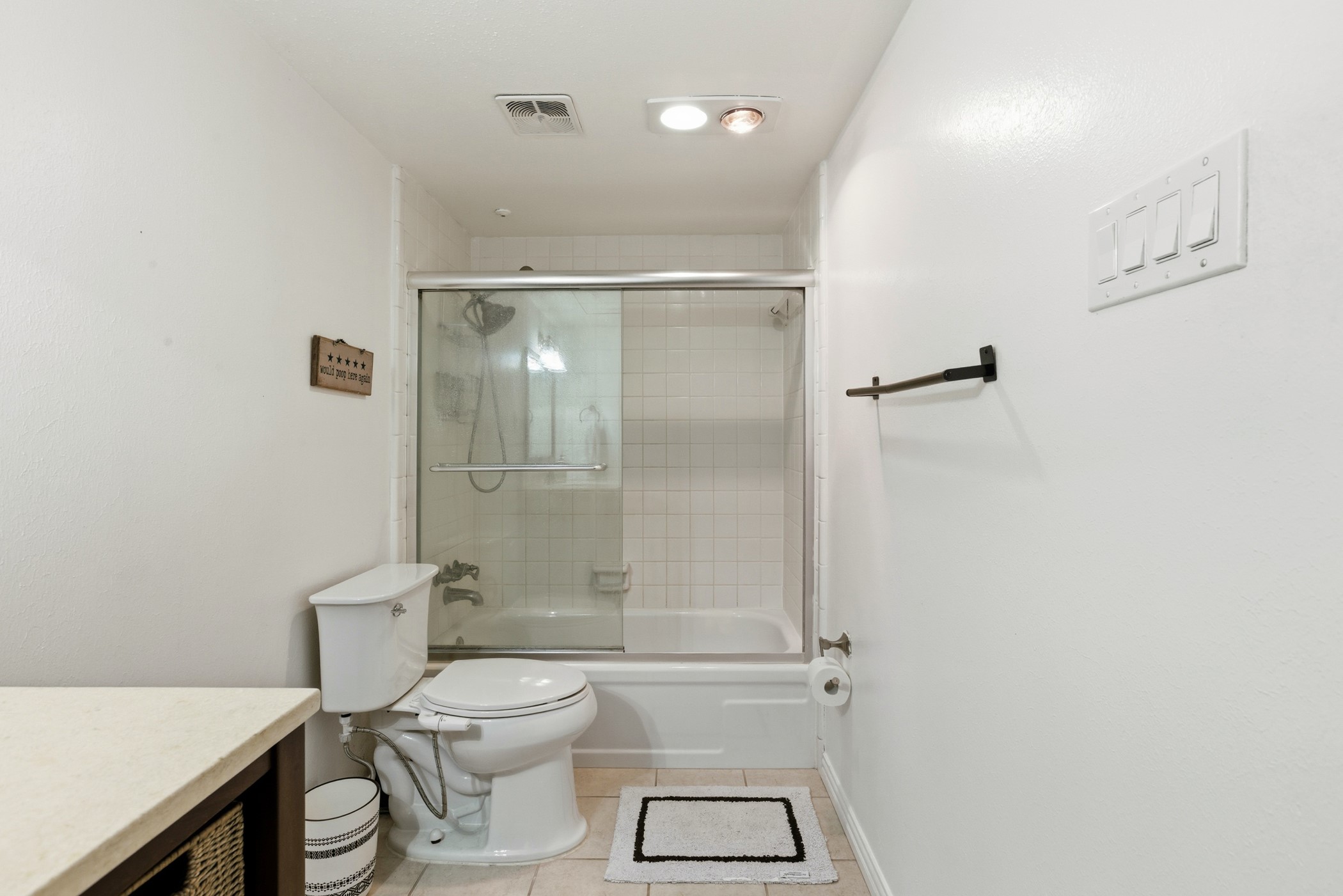 2224 South Piney Point Road, Unit 222 Houston, TX 77063 - Photo 24 of 28 a bathroom with a toilet a sink and shower