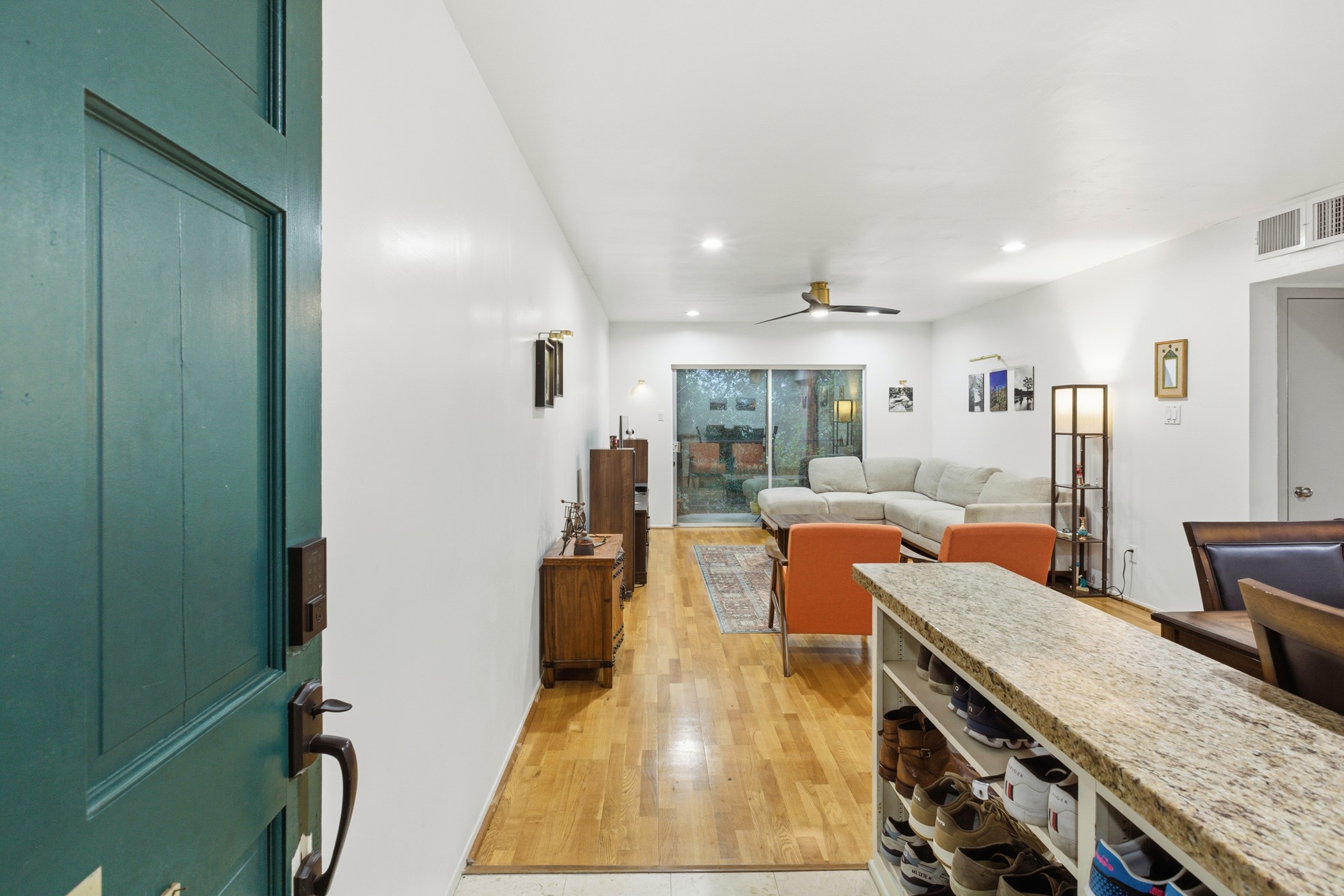 2224 South Piney Point Road, Unit 222 Houston, TX 77063 - Photo 5 of 28 a living room with stainless steel appliances granite countertop furniture and a kitchen view