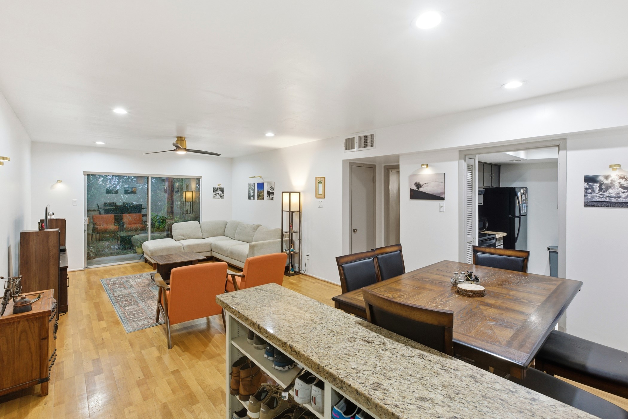2224 South Piney Point Road, Unit 222 Houston, TX 77063 - Photo 6 of 28 a living room with dining table and a table