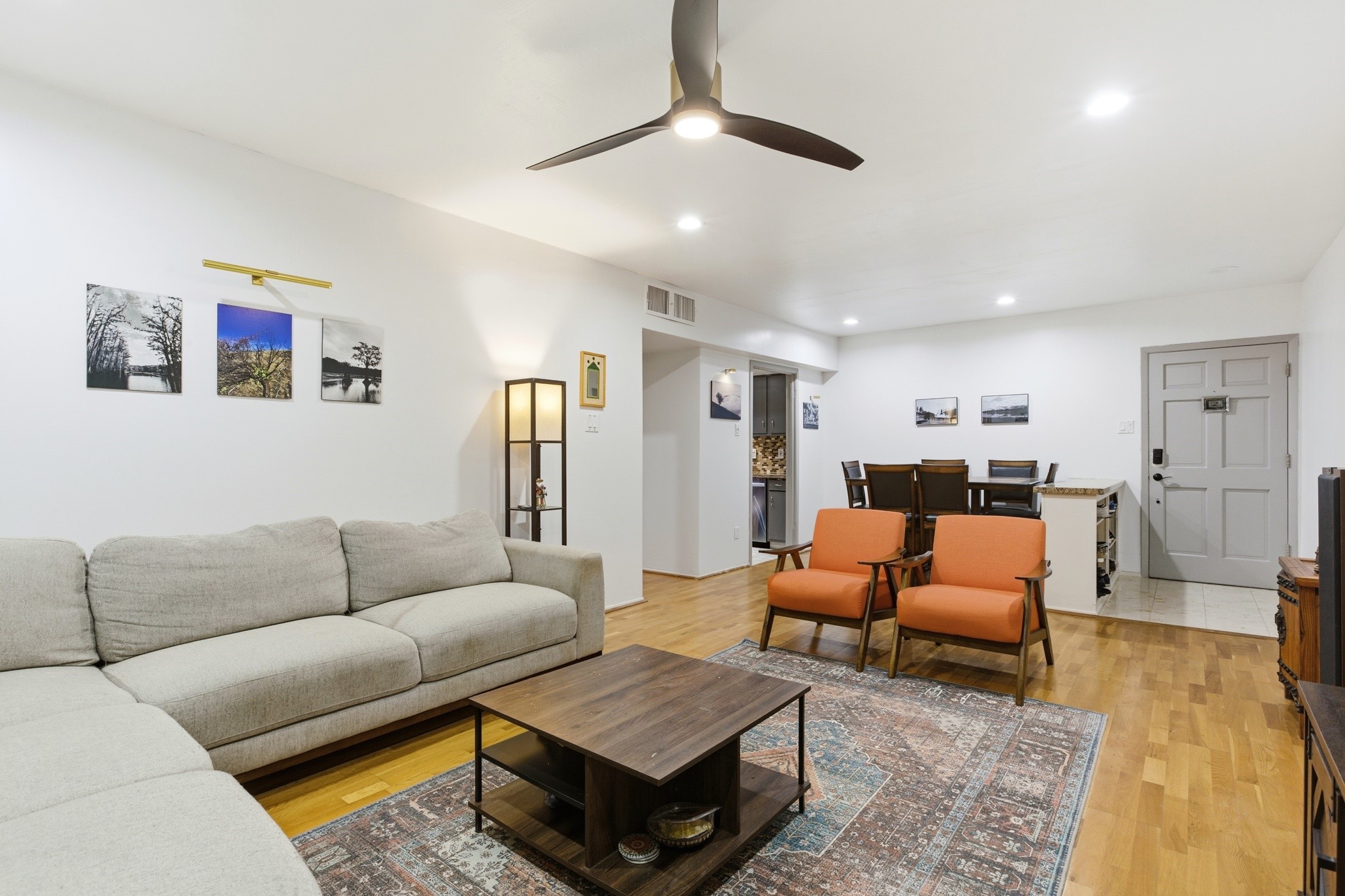 2224 South Piney Point Road, Unit 222 Houston, TX 77063 - Photo 9 of 28 a living room with furniture and a rug