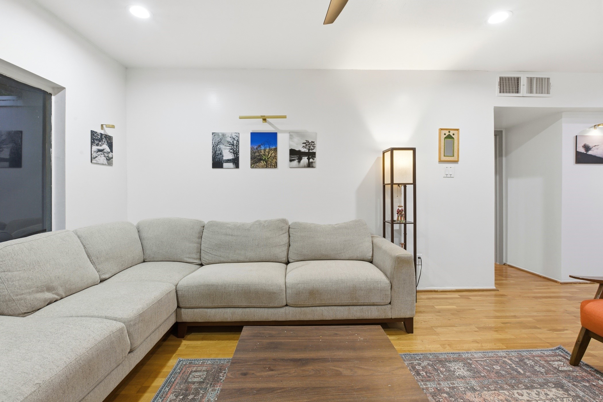 2224 South Piney Point Road, Unit 222 Houston, TX 77063 - Photo 10 of 28 a living room with furniture and wooden floor